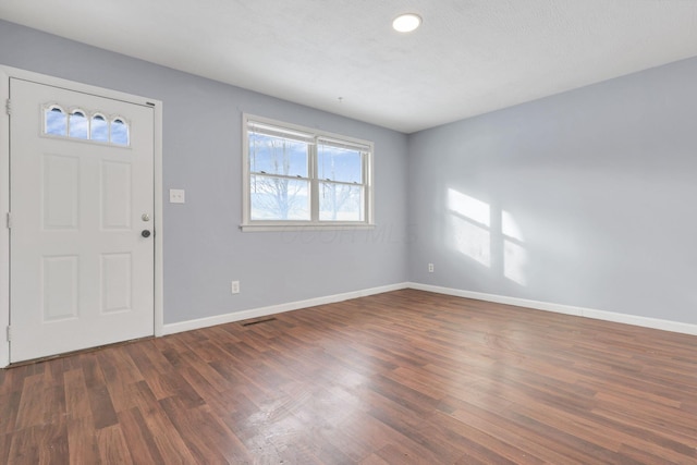 entrance foyer with dark wood-type flooring