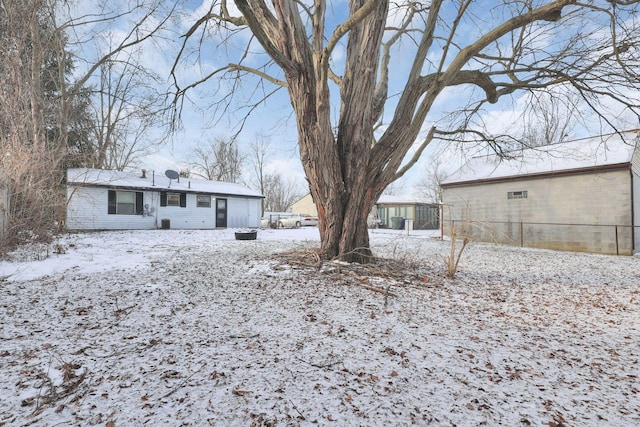 view of yard layered in snow