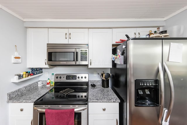 kitchen featuring stone countertops, ornamental molding, white cabinets, and appliances with stainless steel finishes