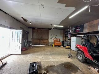 garage featuring white refrigerator