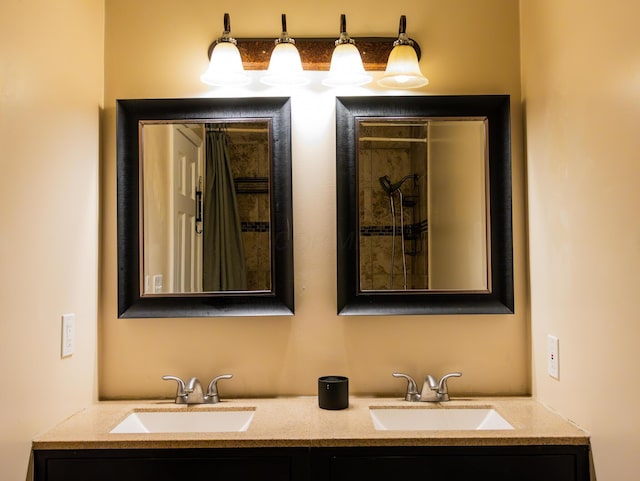 bathroom featuring double vanity and a sink