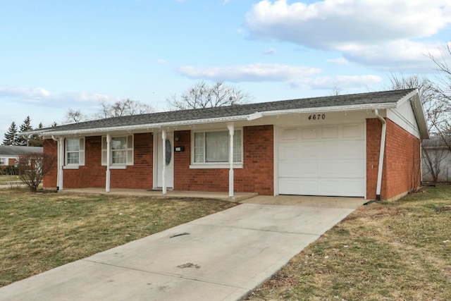 single story home featuring a garage and a front lawn