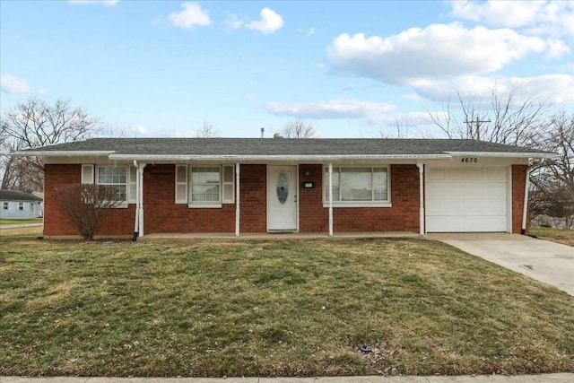 ranch-style home with a garage and a front lawn