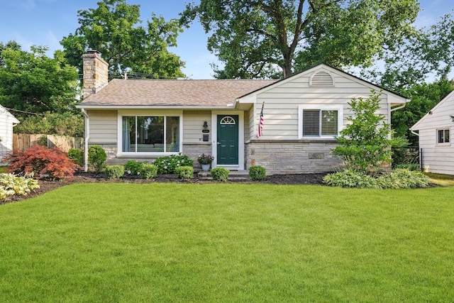 view of front of property with a front lawn