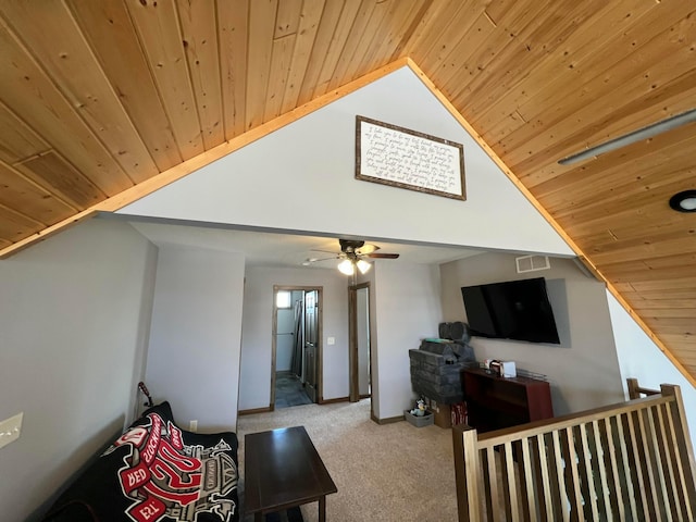 carpeted living room with high vaulted ceiling, wood ceiling, visible vents, and baseboards