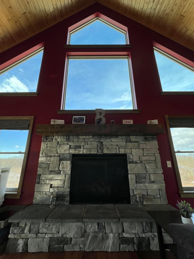 interior details featuring a fireplace and wooden ceiling