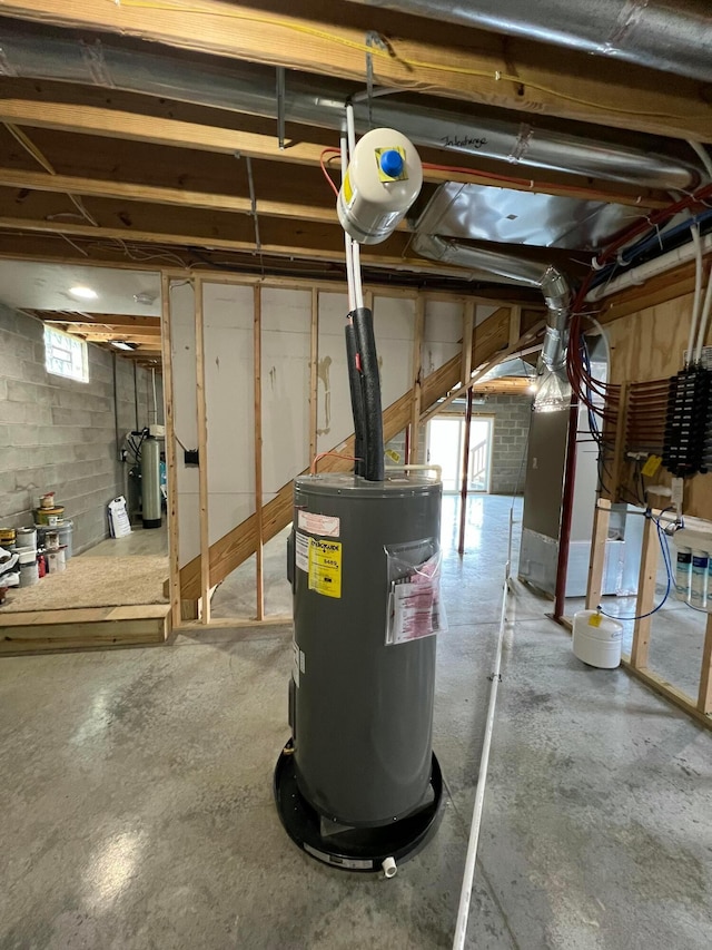 below grade area featuring water heater