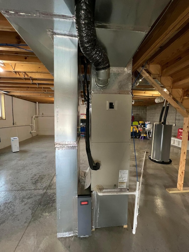 utility room with water heater