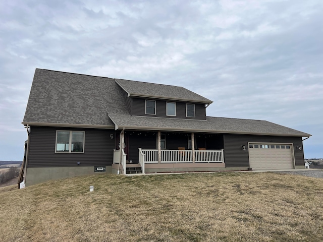 view of front of property featuring a front lawn, covered porch, a shingled roof, and an attached garage