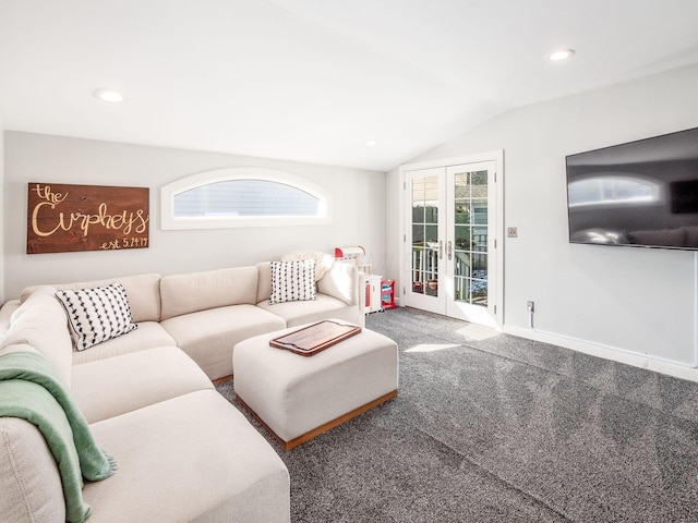 carpeted living room featuring lofted ceiling and french doors