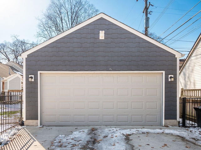 view of snow covered garage