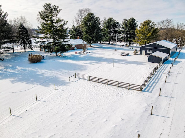 view of yard layered in snow