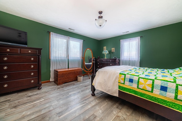 bedroom featuring light wood-type flooring