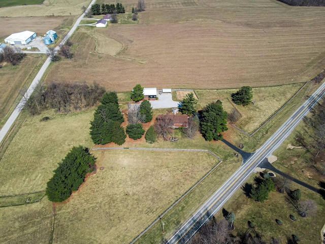 birds eye view of property featuring a rural view