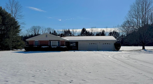 single story home with a garage