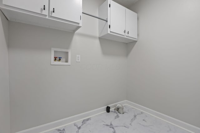 washroom with cabinets and washer hookup