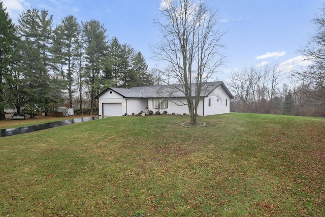 view of yard featuring a garage