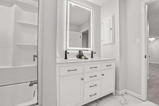 bathroom with vanity and walk in shower