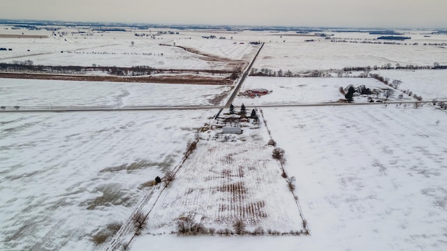 snowy aerial view with a rural view