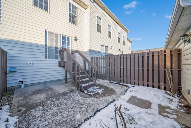 view of snow covered patio