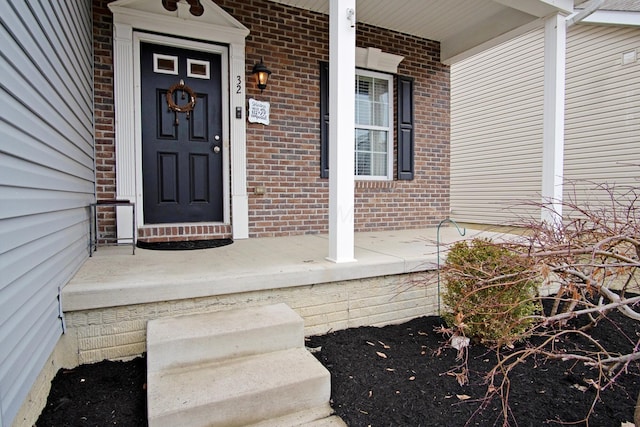 doorway to property with a porch