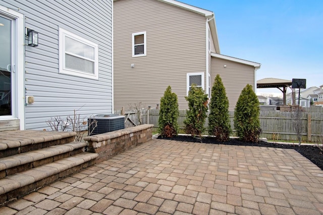 exterior space featuring a patio and central AC unit