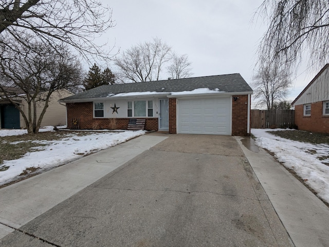 single story home with a garage