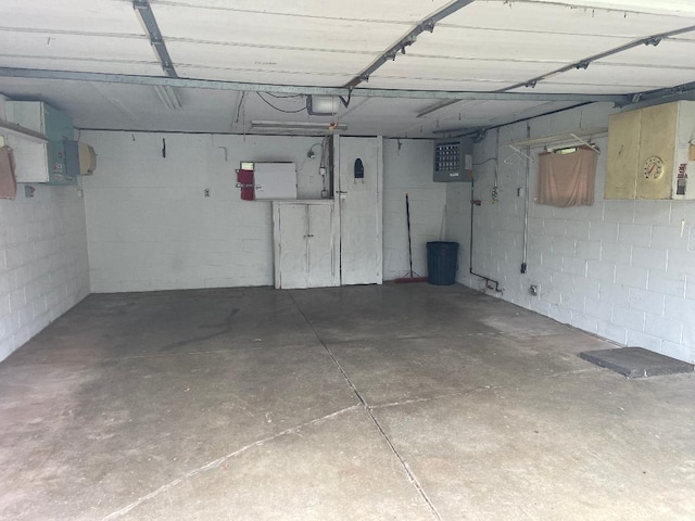 2559 Claridon Rd, Columbus, OH 43231 - garage with concrete block wall and a garage door opener