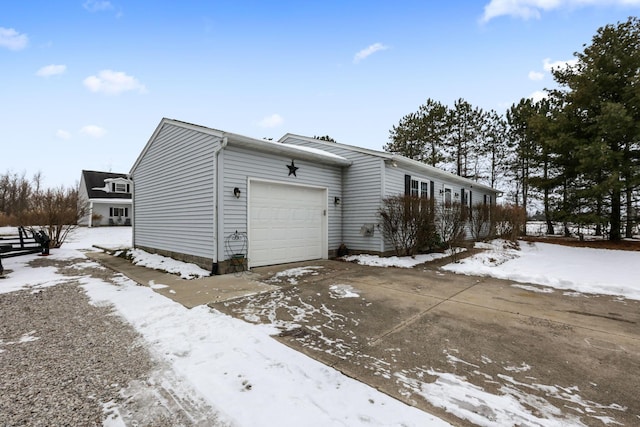 view of snow covered garage