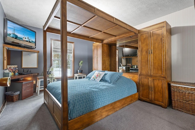 carpeted bedroom with a textured ceiling