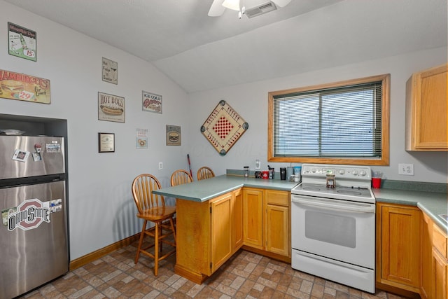 kitchen featuring vaulted ceiling, white electric range, stainless steel fridge, ceiling fan, and kitchen peninsula