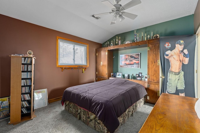 carpeted bedroom featuring lofted ceiling and ceiling fan