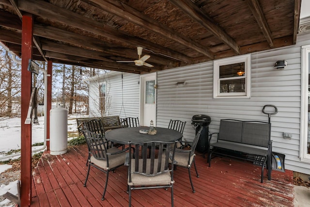 snow covered deck with ceiling fan