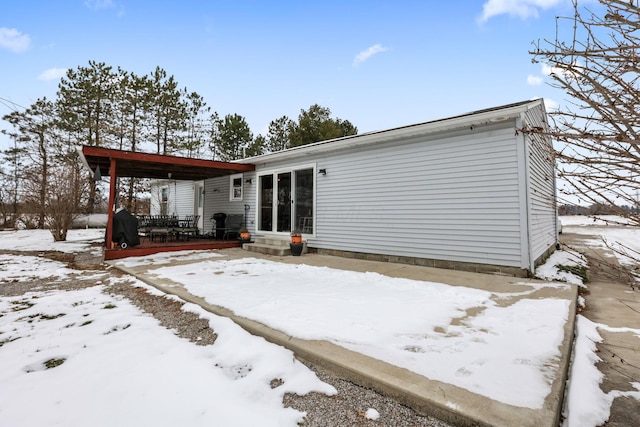 view of snow covered property