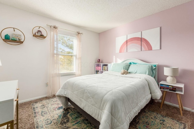 carpeted bedroom with a textured ceiling