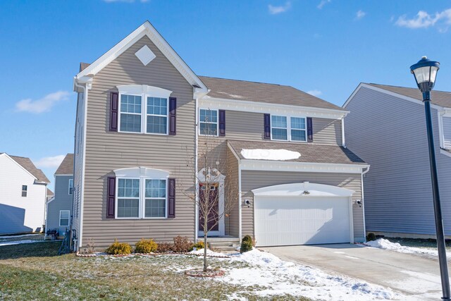 view of front of property featuring a garage