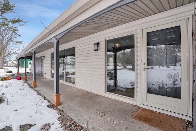 view of snow covered patio