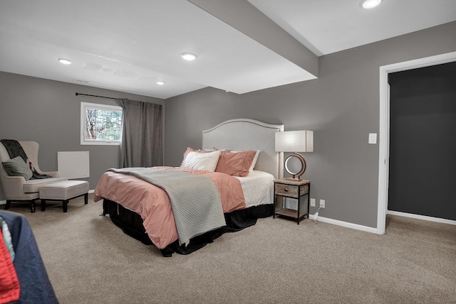 bedroom with recessed lighting, light colored carpet, and baseboards