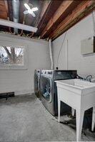 laundry room with washing machine and dryer and laundry area