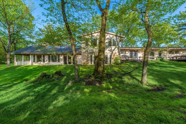 1750 Stoneybrook Way, Blacklick, OH 43004 - back of house with a yard and stone siding