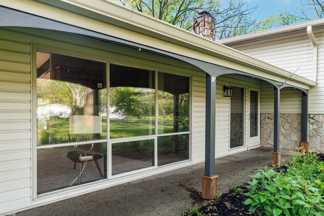 1750 Stoneybrook Way, Blacklick, OH 43004 - view of home's exterior featuring a chimney and stone siding