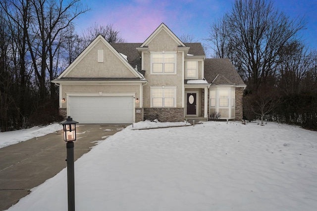 view of front of property with a garage