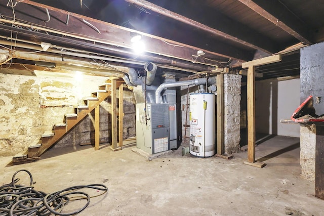 basement with water heater and heating unit