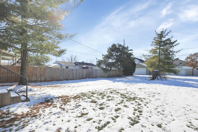 view of yard covered in snow