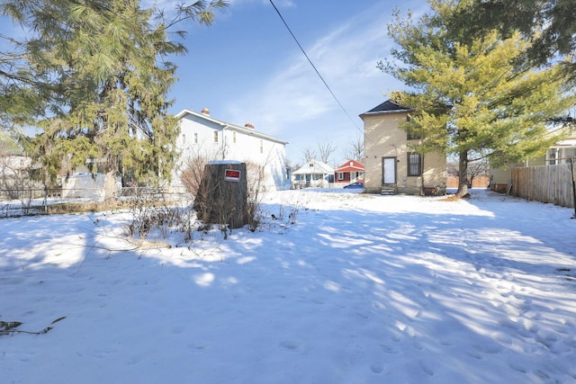 view of yard covered in snow