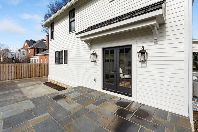 property entrance with french doors and a patio area