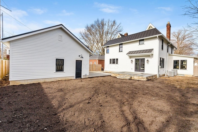 rear view of property with a patio