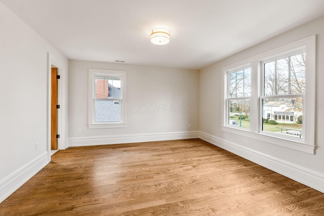 empty room featuring light hardwood / wood-style floors