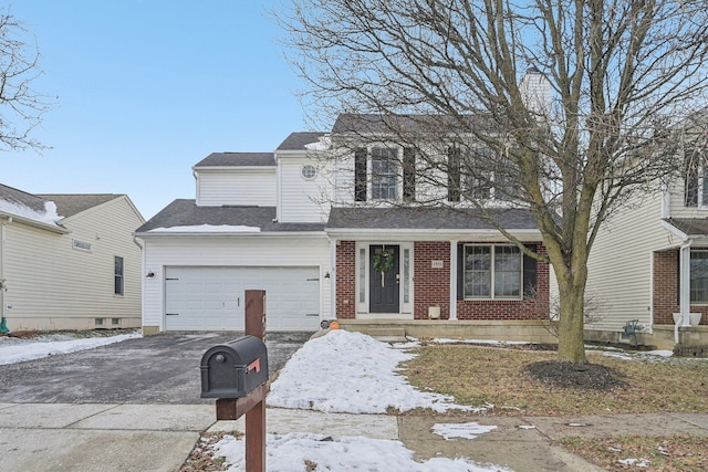 front of property featuring a garage