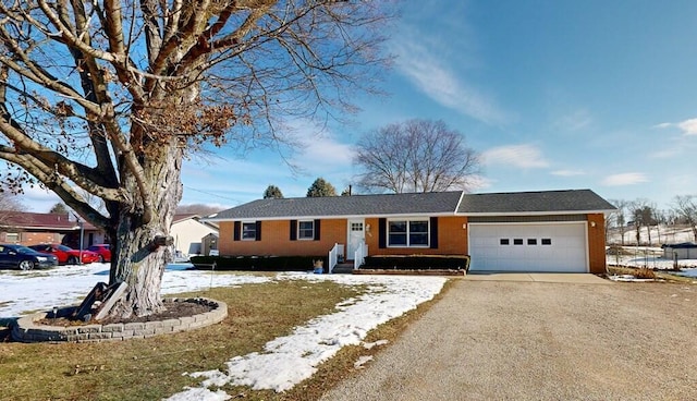 single story home with a garage